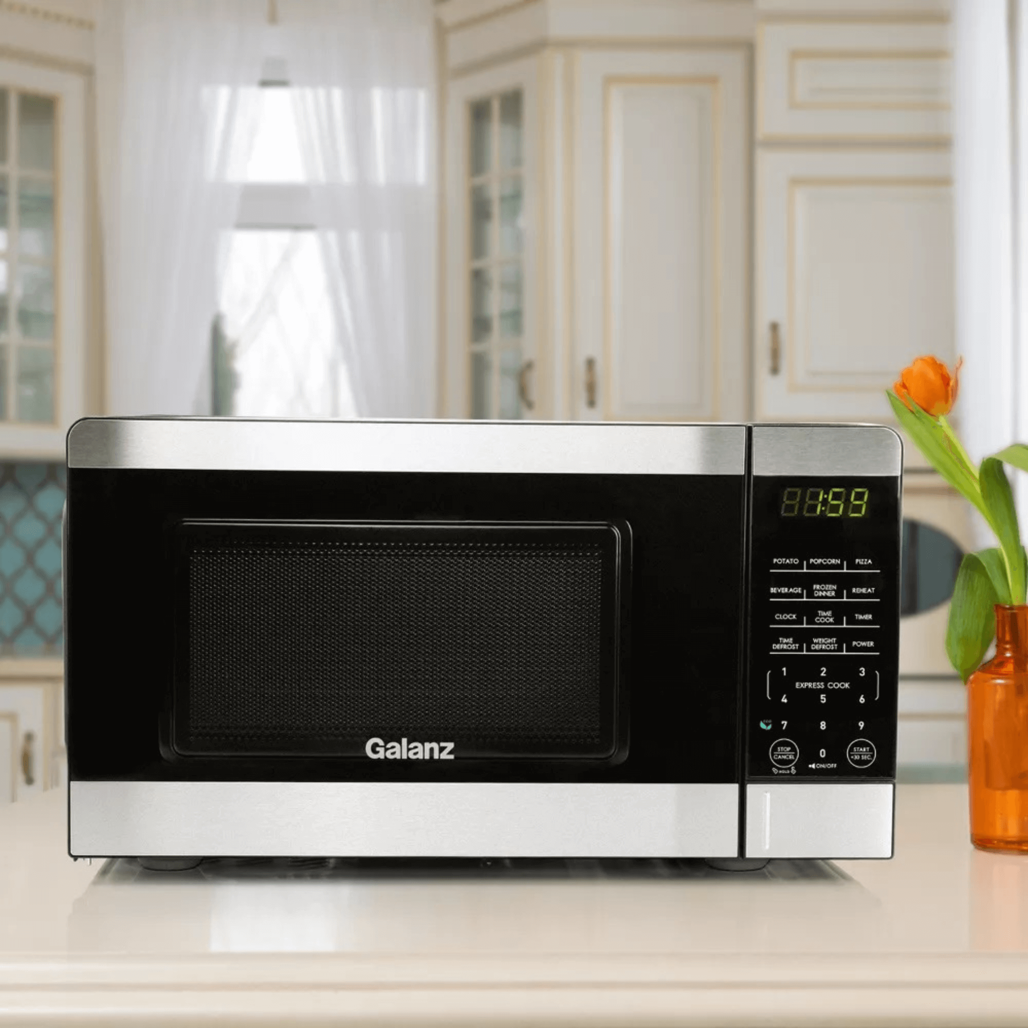 Galanz 0.7 Cu. Ft. 700 Watt Countertop Microwave Oven with Stainless Accents
