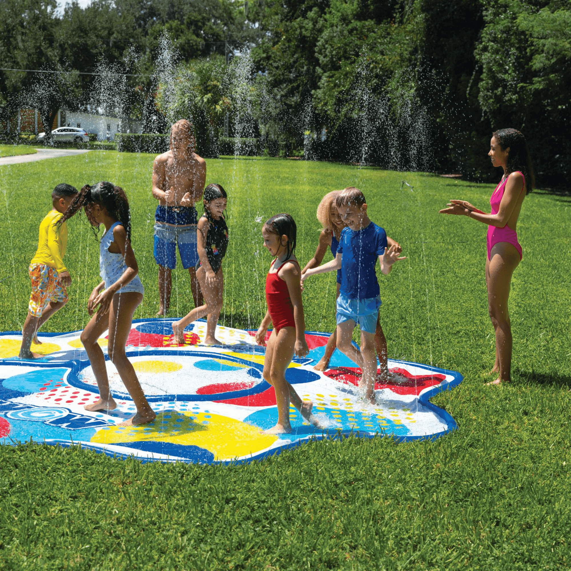 WOW Watersports 12ft Dots Spray Pad with Inflatable Edge Rim to Retain Water