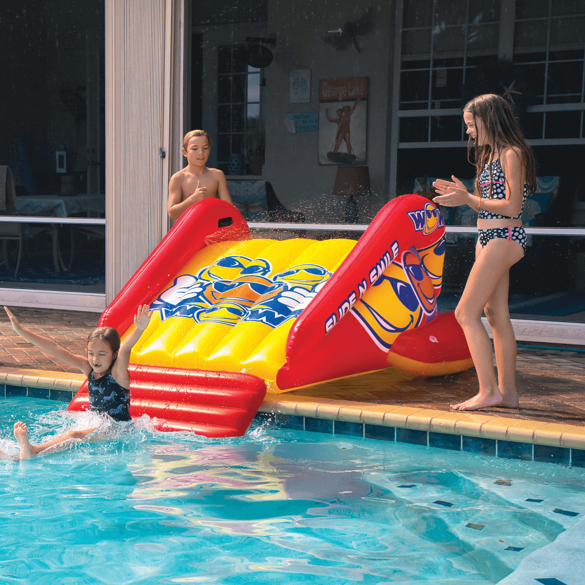 WOW Watersports Slide N Smile Inflatable Pool Slide with Sprinklers